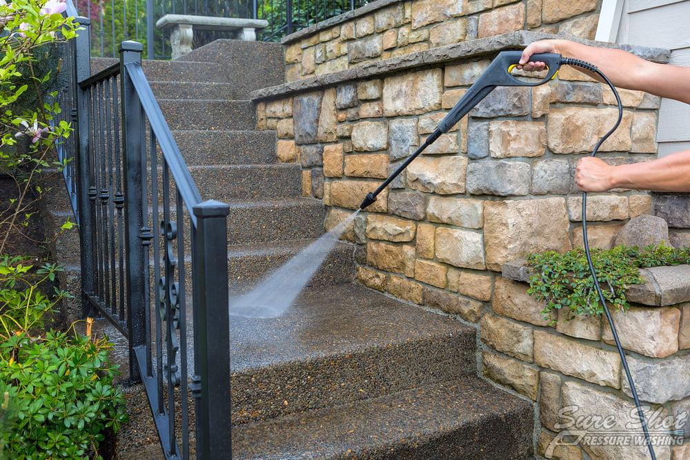 Washing,The,House,Front,Entrance,Stair,Steps,And,Stone,Walls How Powerwashing Can Increase Your Home’s Asking Price